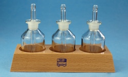 Karl Hecht Wooden blockwith3 brown pipette bottles 50 g., Quantity: Each