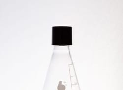 Bellco Glass, Inc. Manufactured from type 1 class a Borosilicate glass. Ideal for culture aerobic & anaerobic organisms, media storage and mixing. Deep skirted screw caps protect against contamination. Supplied with rubber line black phenolic caps and graduated to approxima
